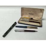A boxed Parker 51 set and a Parker 51 with a gold