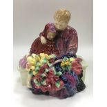 A Royal Doulton figural group 'The Flower Seller's