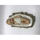 A goebel / Hummel figure in the form of a baby in