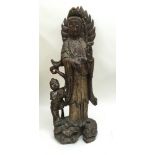 A large 19th century Chinese heavily carved wooden