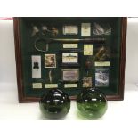A framed and glazed fishing display and two glass