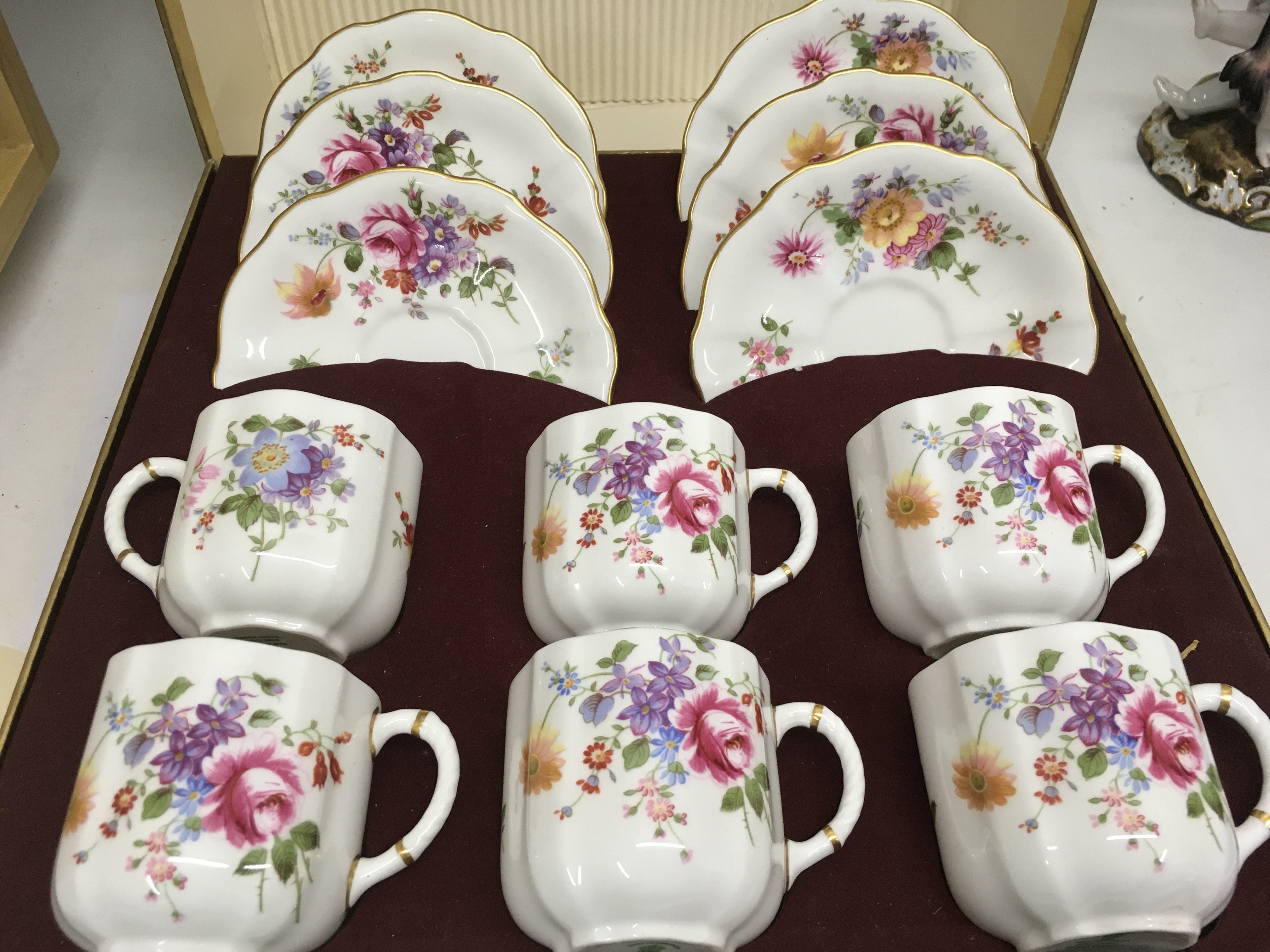 A boxed Royal Crown Derby tea set comprising six c
