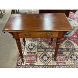 A small mahogany side table