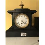 A Victorian slate clock with Roman numerals inset