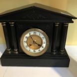 A Victorian slate mantle clock with Arabic numeral