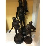 Three spelter figures in the form of soldiers. Mea