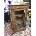 A Victorian inlaid rosewood pier cabinet with bras