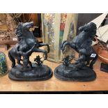 A pair of Victorian painted spelter Marley horses, 41cm.