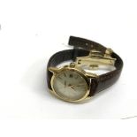 An 18k gold handmade Dreyfuss & co watch. Complete