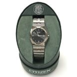 A gents Citizen watch, Eco Drive. With a diamond bezel. In its original box and complete with