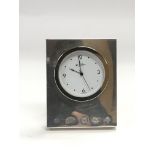 A small silver cased travelling clock, Sheffield h