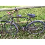 A Vintage trade bike with additional saddle
