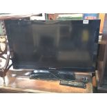 A Polaroid Flat screen TV with remote. 32inch.