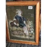 A maple framed Victorian tapestry embroidery of a young child.