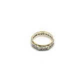 A 9ct gold white sapphire eternity ring, approx 3.