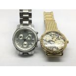 Two ladies watches comprising a Guess example and