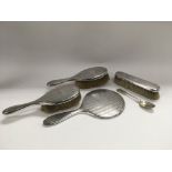 A silver four piece dressing table set, London hal