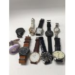 A collection of mixed watches including brands suc