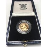 A gold half proof sovereign, 1999. With original c