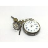 A ladies silver cased fob watch with attached keys