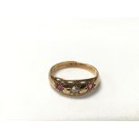An 18ct gold hallmarked ruby and diamond set ring.