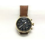 A gents Ingersoll chronograph watch with a navy bl