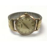 A gents vintage gold Majex watch, with an inscribe