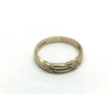 A 9ct gold ring set with small diamonds, approx 2g
