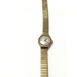 A ladies 9ct gold cased Tudor watch, seen working