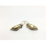 A pair of Victorian gold earrings in the form of u