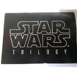 A Star Wars trilogy advertising board, approx 84cm