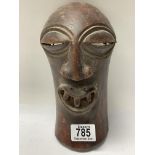 A small African tribal mask. 22cm.