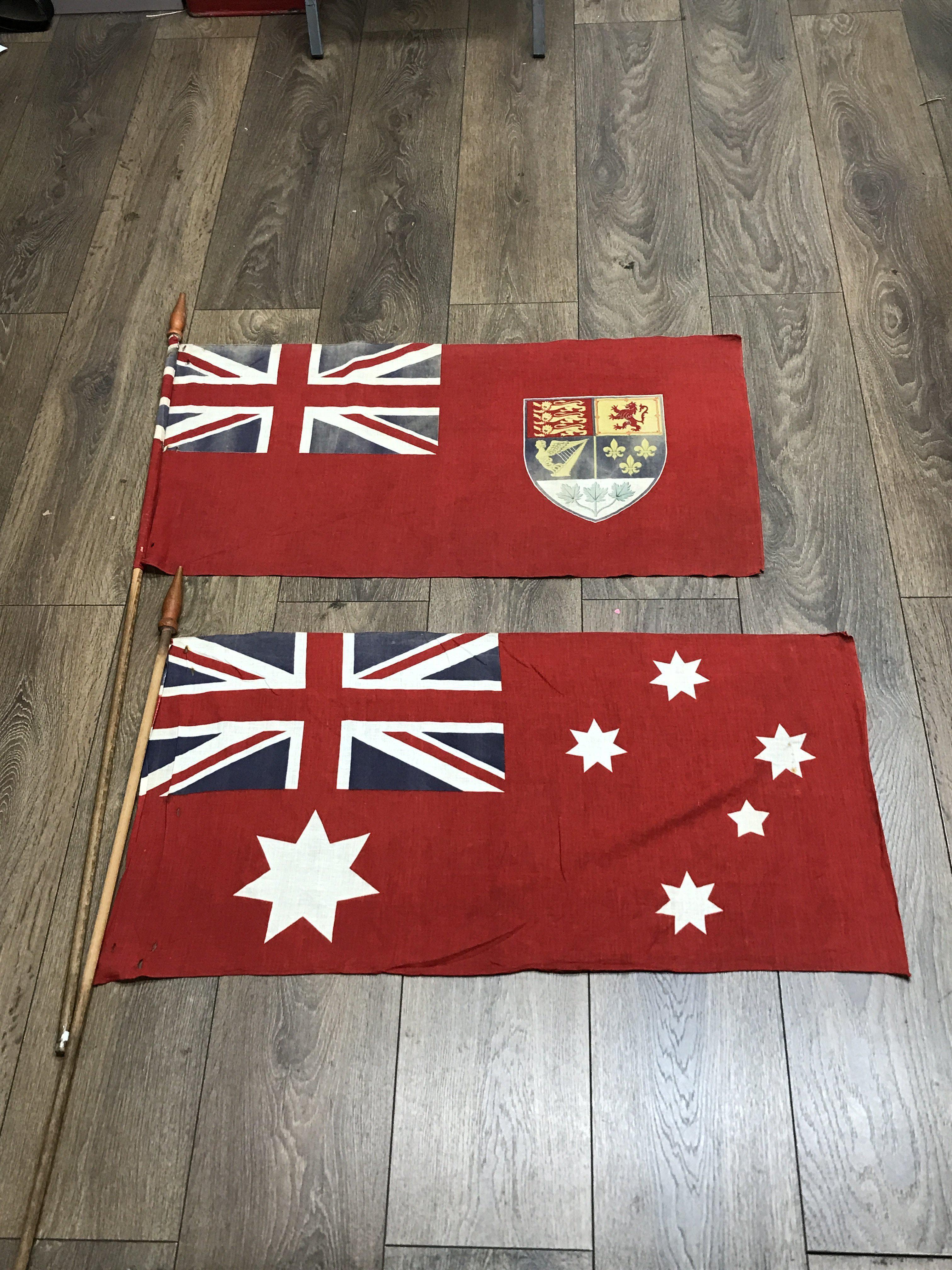 Two naval tiller flags. One is the Australian red
