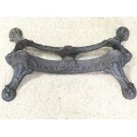 A rare Victorian cast iron bike stand with bat hea