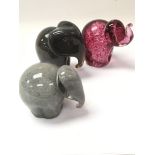 Three glass elephants - two that are Wedgwood and