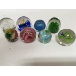 A collection of glass paperweights (8) - NO RESERV