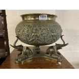 A large eastern brass bowl on stand. 30cm x 27cm.