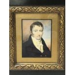 A framed portrait miniature of a Victorian gentlem