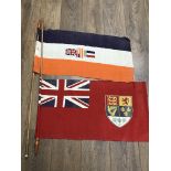 Two naval tiller flags. One is the old South Afric
