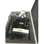 A modern Apex microscope fitted for electric in a