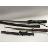 Two replica Samurai swords.