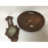 A small oak cased Aneroid Barometer and a treen wa