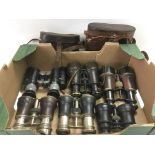 Two pairs of military binoculars and four others (