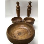 Five good quality treen item; bowls and lamp bases