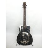 A Vintage Resonator guitar and hard shell carry ca
