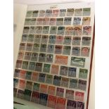 A large collection of world stamps presented in tw