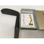 A Harrison golf club with oak shaft.together with a john players golf card .