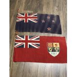 Two naval tiller flags - one is the New Zealand fl
