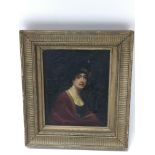 A framed small portrait on panel of a 19th century