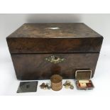 An antique burr walnut box with later alterations